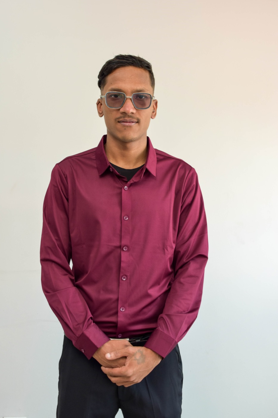 Portrait of a SalesHubNepal team member at the Kathmandu distribution HQ