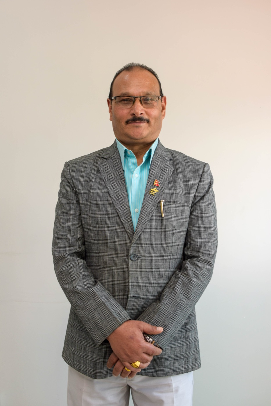 Portrait of a SalesHubNepal team member at the Kathmandu distribution HQ