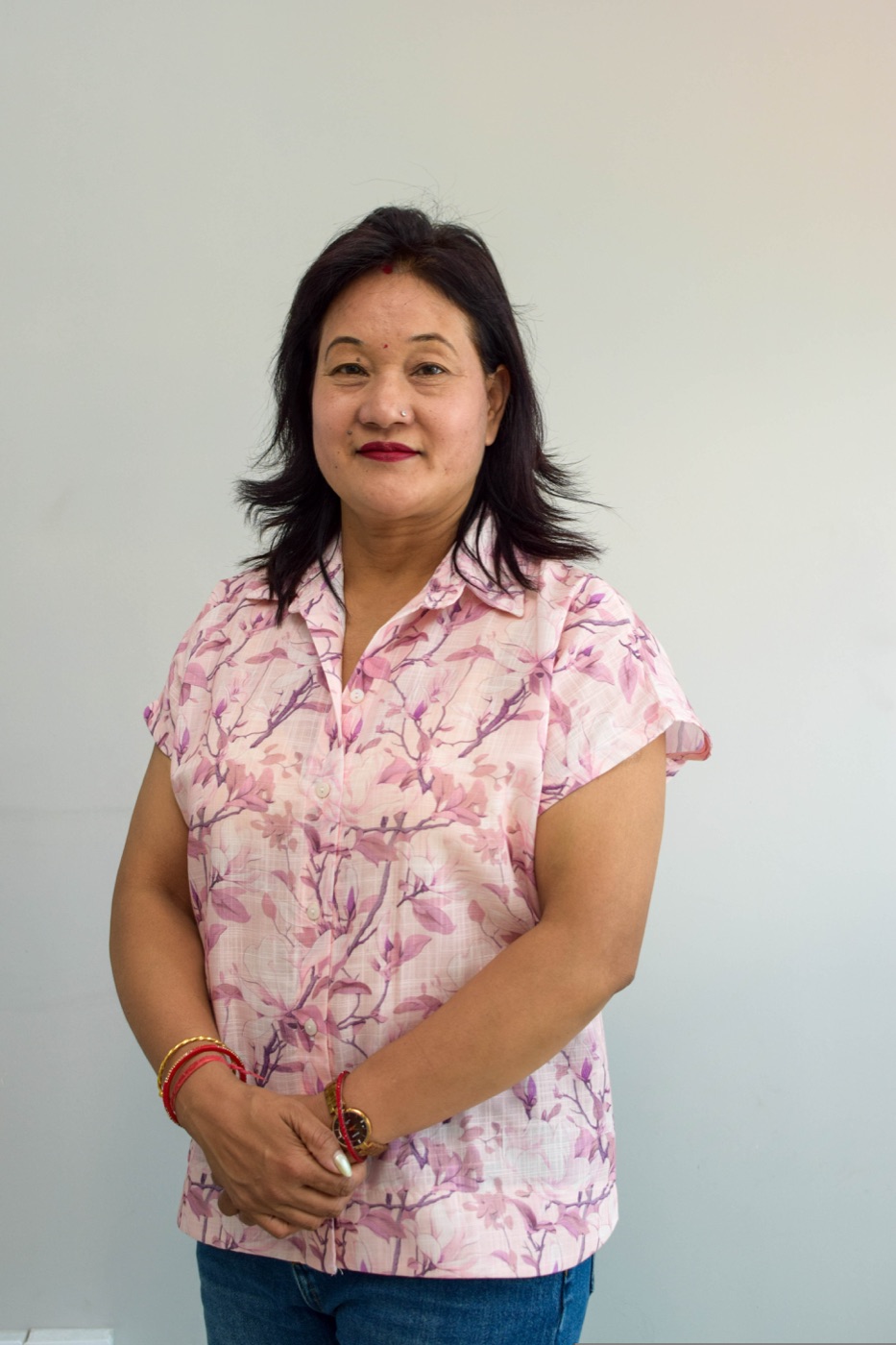 Portrait of a SalesHubNepal team member at the Kathmandu distribution HQ