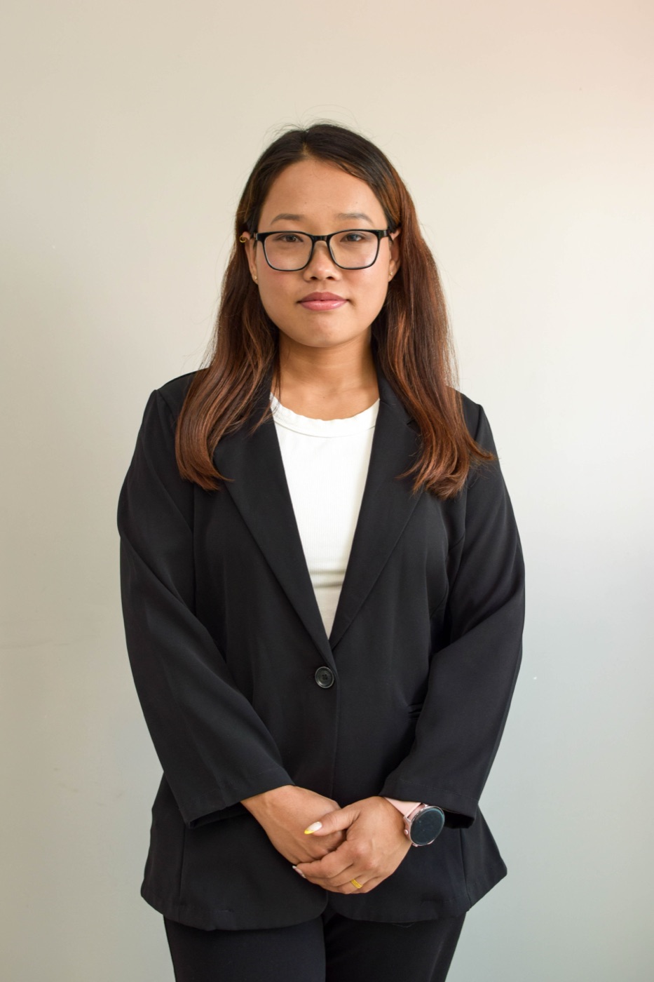 Portrait of a SalesHubNepal team member at the Kathmandu distribution HQ